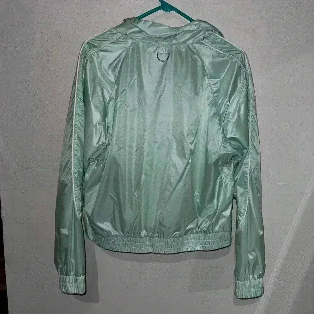 PUMA - WOMENS EVIDE JACKET Mist Green - Picture 8 of 8